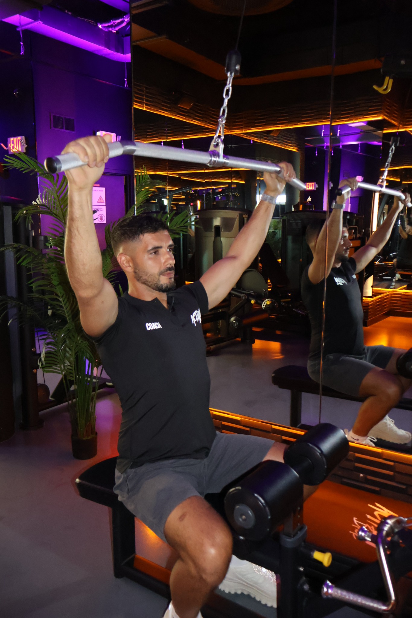 Houssam demonstrating strength training